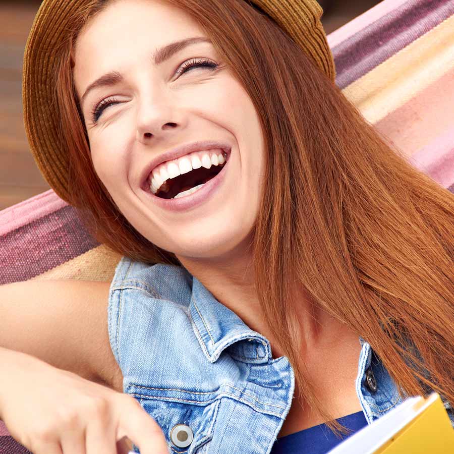 A woman smiling